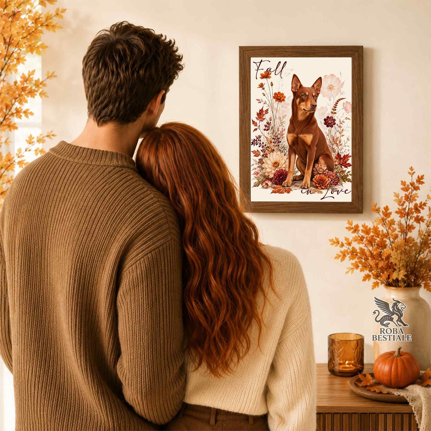 Quadretto con la stampa A4 di un Australian Kelpie seduto in mezzo a fiori e foglie autunnali. Grafica originale Roba Bestiale, collezione Fall in Love