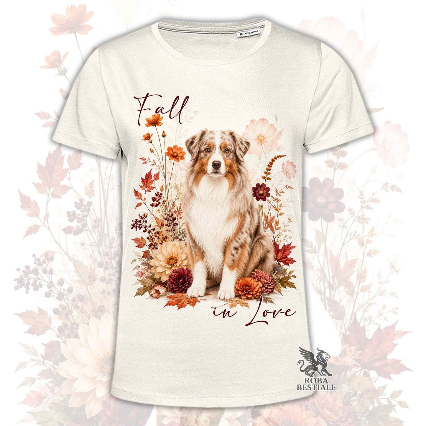 T-shirt beige stampata con un Australian Shepherd seduto in mezzo a fiori e foglie autunnali. Grafica originale Roba Bestiale, collezione Fall in Love