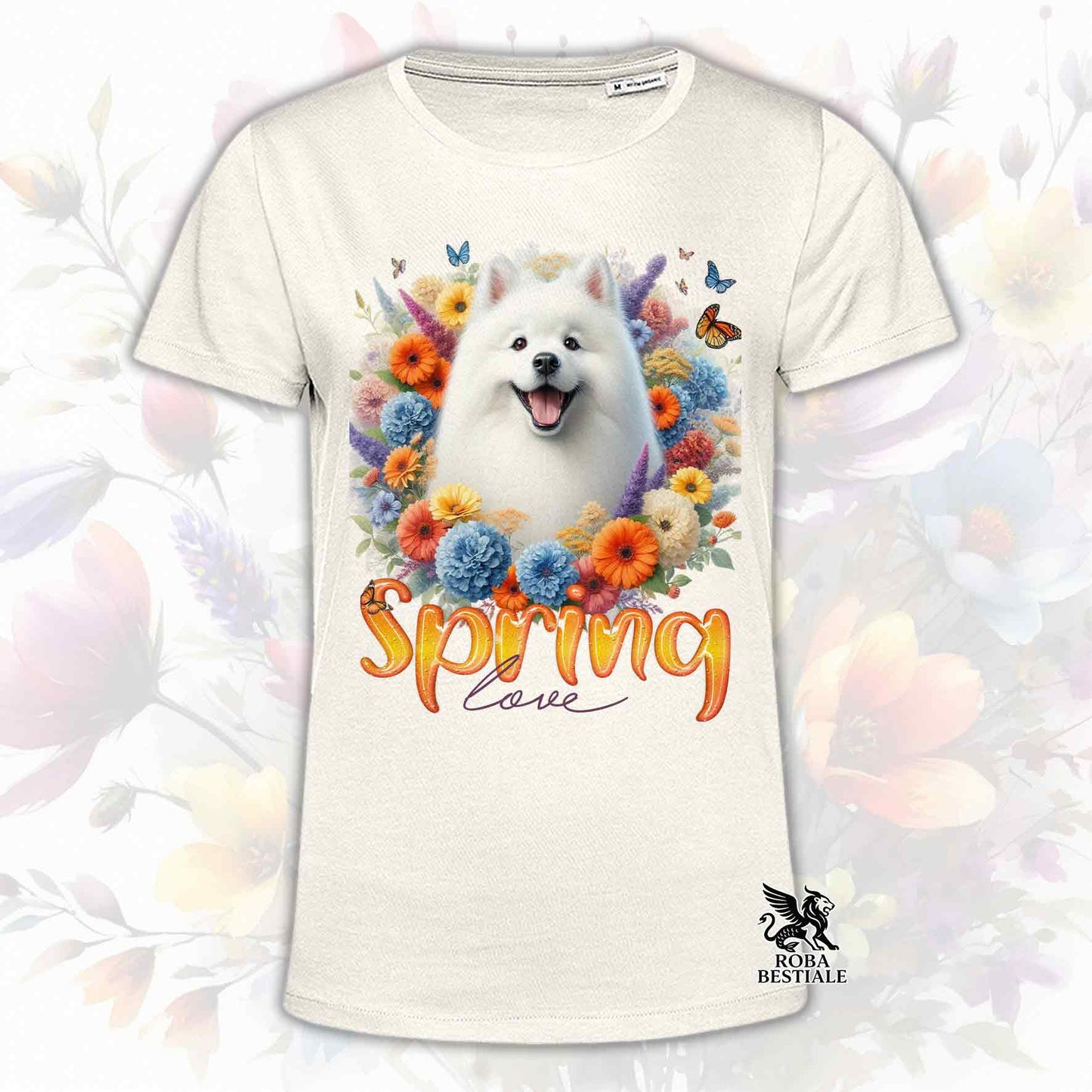 Una t-shirt beige stampata con uno Spitz Giapponese immerso in fiori colorati. Collezione Spring Love di Roba Bestiale
