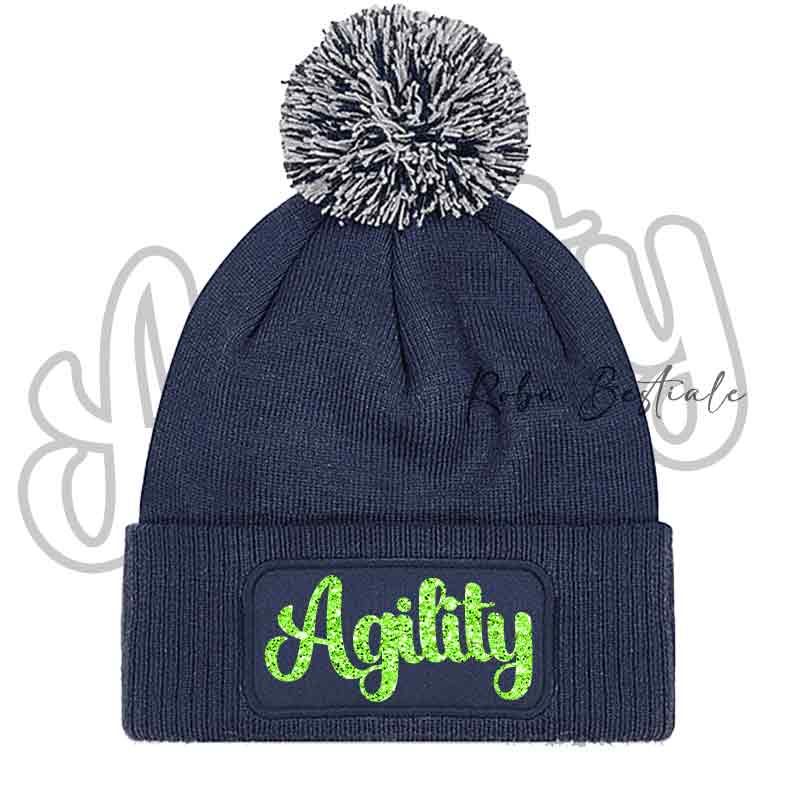 Cappellino invernale blu navy con pon pon e scritta Agility verde lime glitter