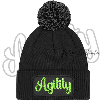 Cappellino invernale nero con pon pon e scritta Agility verde lime glitter