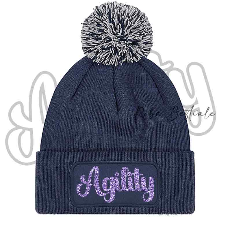 Cappellino invernale blu navy con pon pon e scritta Agility viola glitter