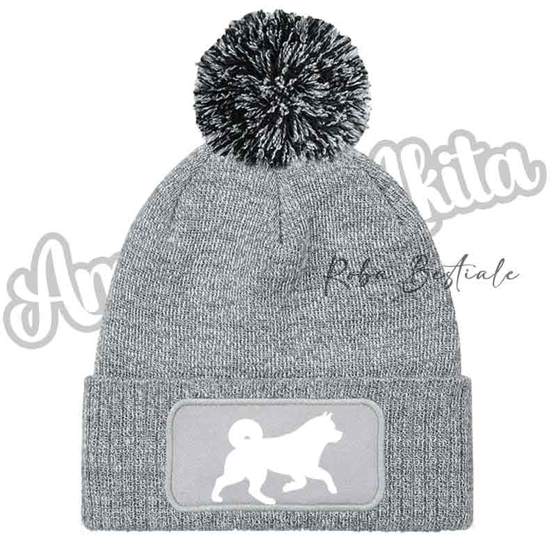 Cappellino invernale grigio chiaro con pon pon e toppa cane glitter bianco