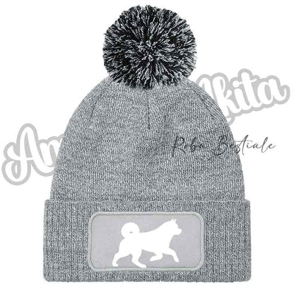Cappellino invernale grigio chiaro con pon pon e toppa cane glitter bianco