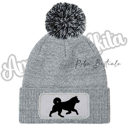 Cappellino invernale grigio con pon pon nero e toppa con cane nero