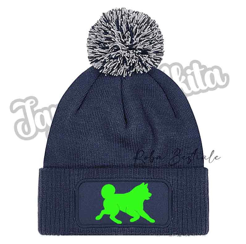 Cappellino invernale blu navy con pon pon argento e patch cane verde brillante
