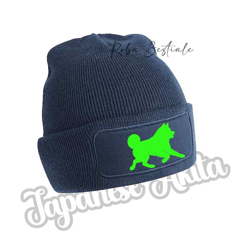 Cappellino invernale in maglia blu navy con applicazione cane verde lime sul fondo