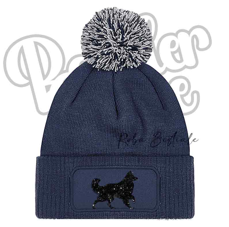 Cappellino invernale blu navy con pon pon grigio e toppa cane nero