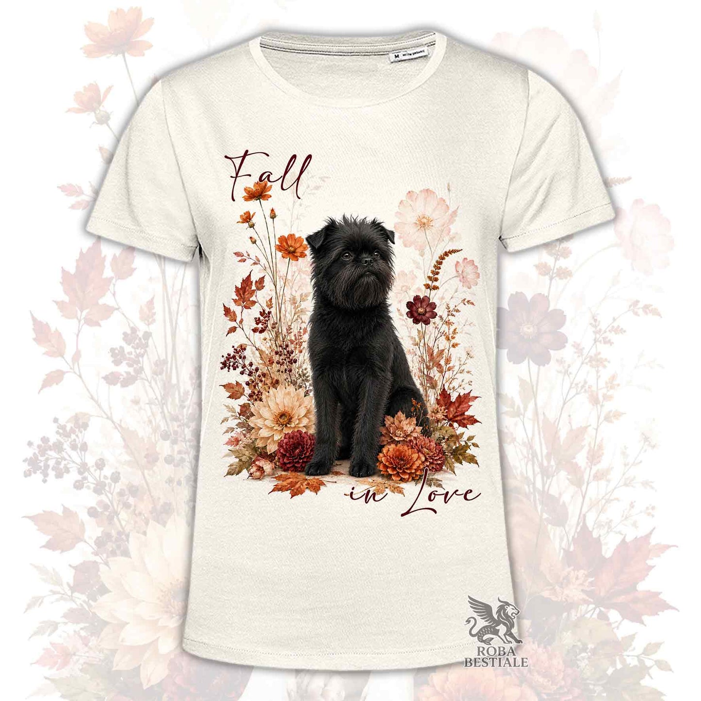 T-shirt beige stampata con un Affenpinscher seduto in mezzo a fiori e foglie autunnali. Grafica originale Roba Bestiale, collezione Fall