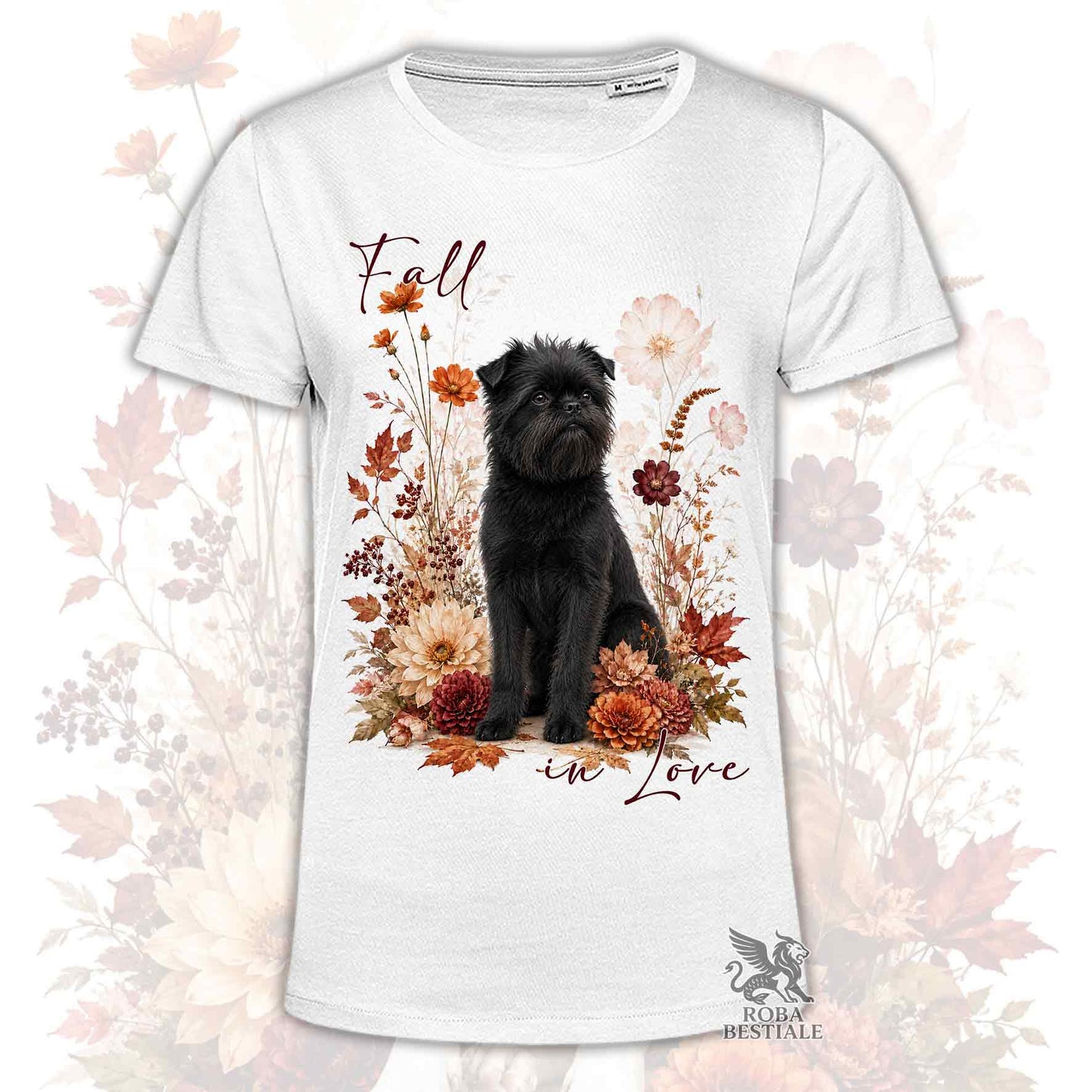 T-shirt bianca stampata con un Affenpinscher seduto in mezzo a fiori e foglie autunnali. Grafica originale Roba Bestiale, collezione Fall
