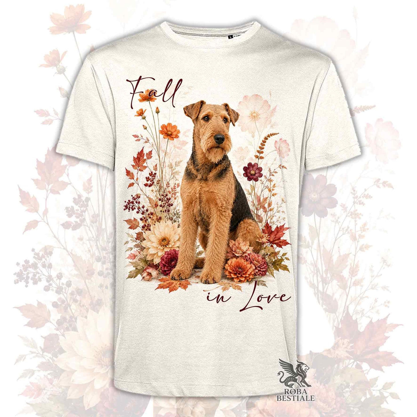 T-shirt beige stampata con un Airedale Terrier seduto in mezzo a fiori e foglie autunnali. Grafica originale Roba Bestiale, collezione Fall