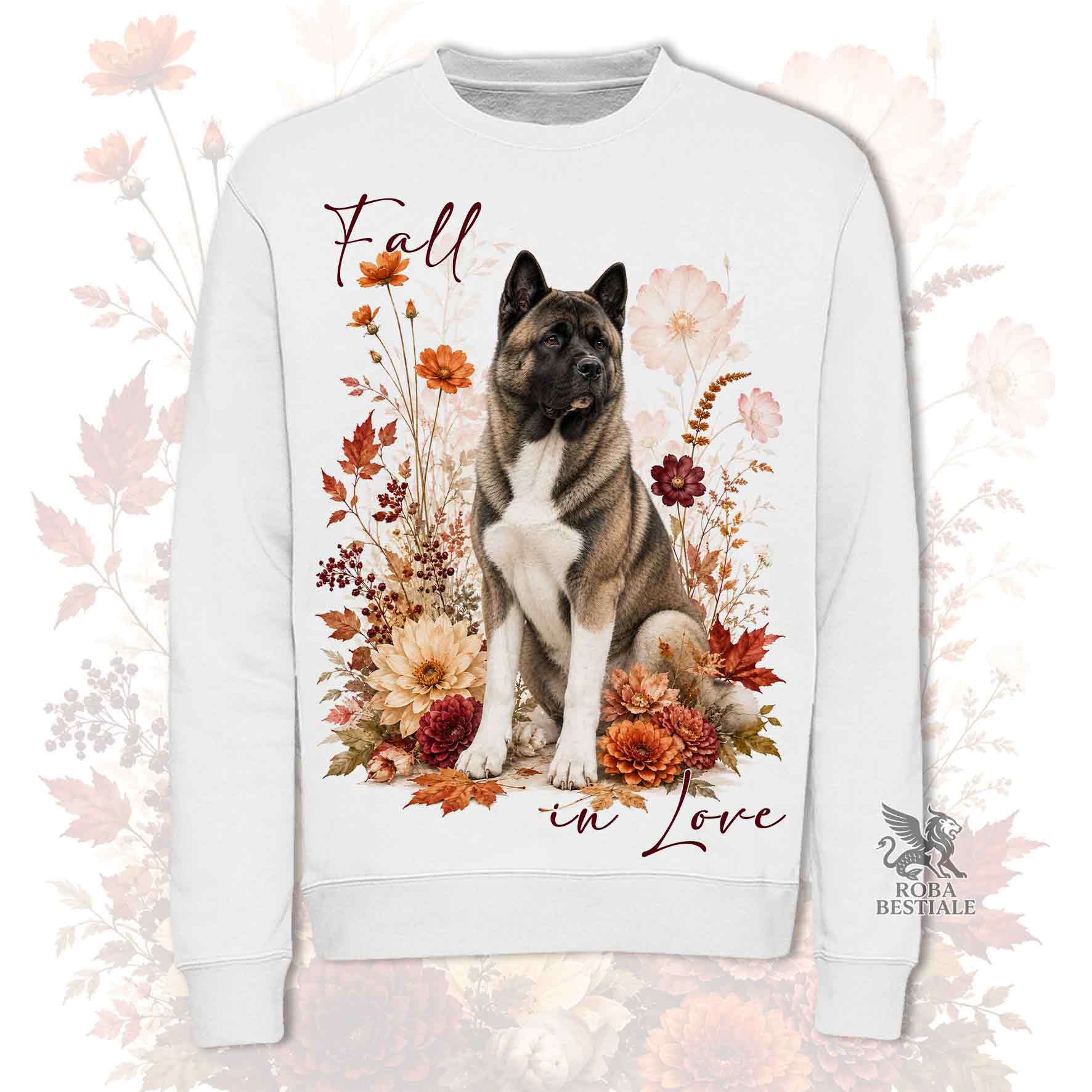 Felpa girocollo bianco stampata con un Akita Americano seduto in mezzo a fiori e foglie autunnali. Grafica originale Roba Bestiale, collezione Fall in Love