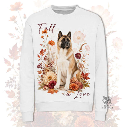 Felpa girocollo bianco stampata con un Akita Americano seduto in mezzo a fiori e foglie autunnali. Grafica originale Roba Bestiale, collezione Fall in Love