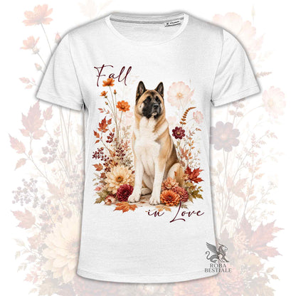 T-shirt bianca stampata con un Akita Americano seduto in mezzo a fiori e foglie autunnali. Grafica originale Roba Bestiale, collezione Fall