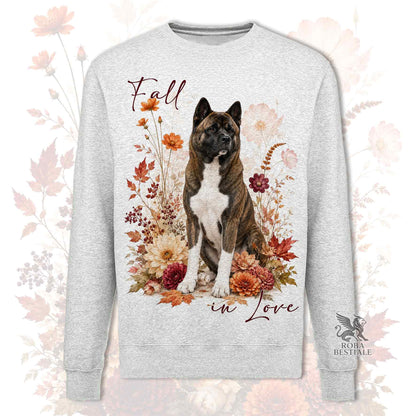 Felpa girocollo grigio stampata con un Akita Americano seduto in mezzo a fiori e foglie autunnali. Grafica originale Roba Bestiale, collezione Fall in Love