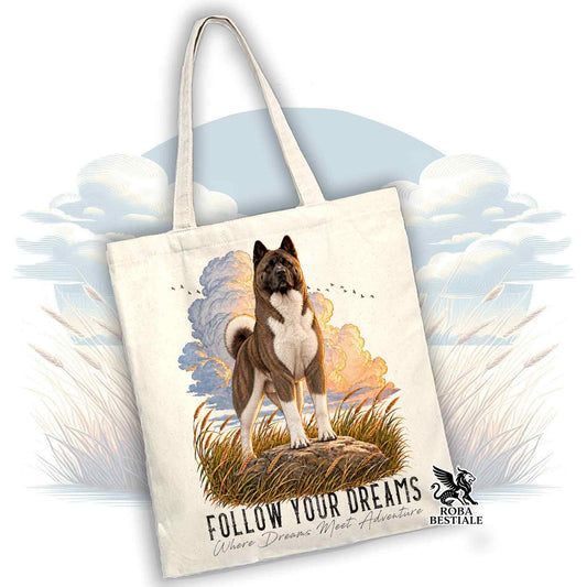 Tote bag bianca con stampa cane su prato, illustrazione cielo e logo Bestiale.