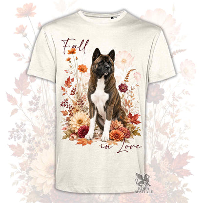 T-shirt beige stampata con un Akita Americano seduto in mezzo a fiori e foglie autunnali. Grafica originale Roba Bestiale, collezione Fall