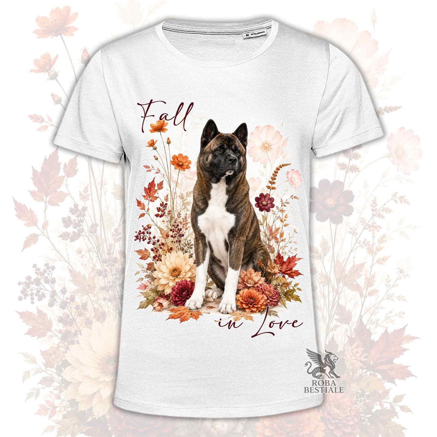 T-shirt bianca stampata con un Akita Americano seduto in mezzo a fiori e foglie autunnali. Grafica originale Roba Bestiale, collezione Fall