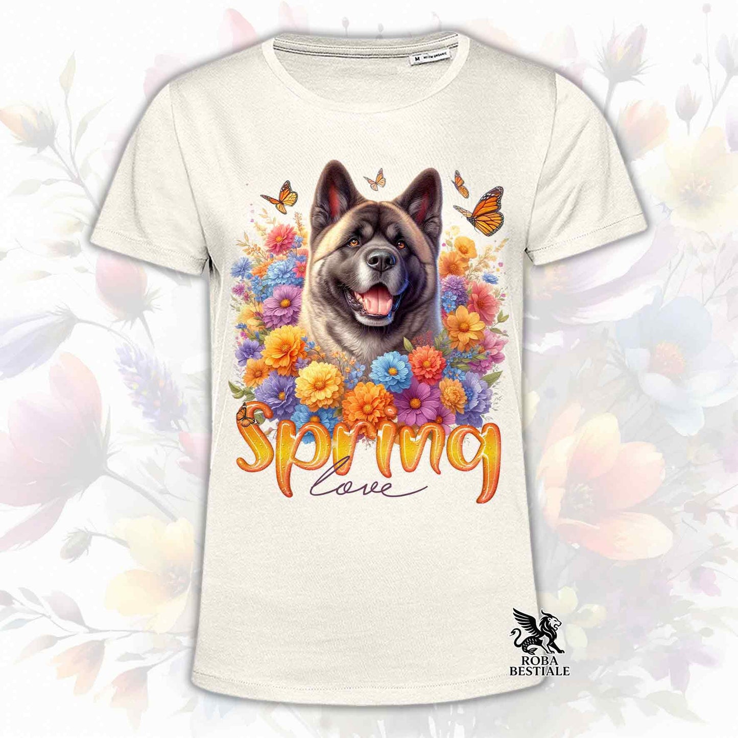 Una t-shirt beige stampata con un Akita Americano immerso nei fiori colorati. Collezione Spring Love di Roba Bestiale