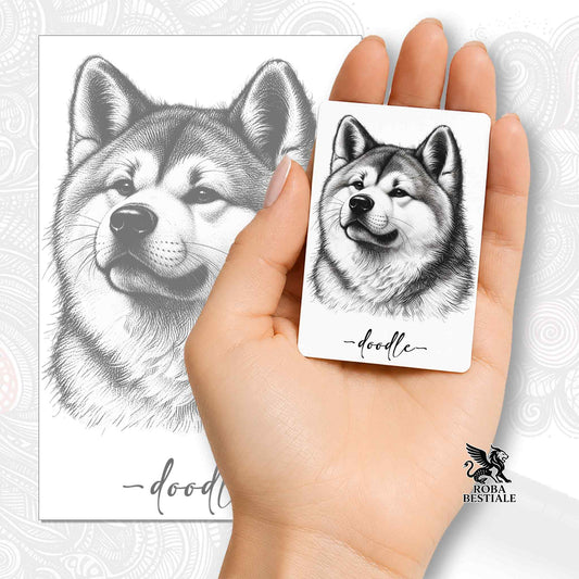 Calamita con Akita Inu in bianco e nero