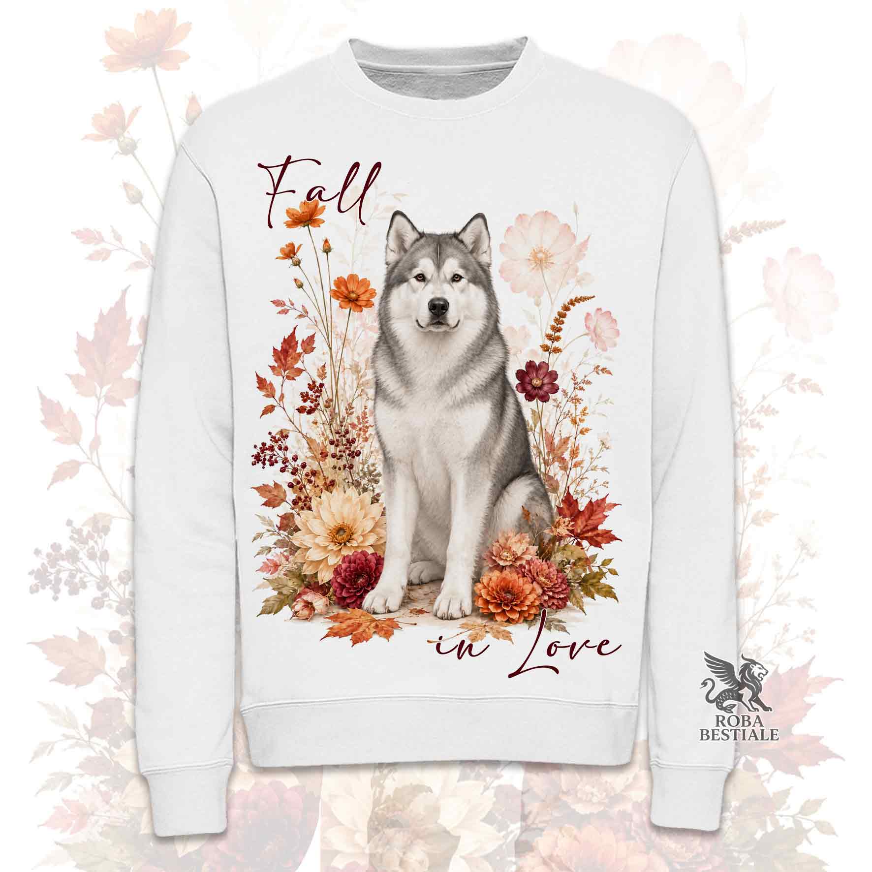 Felpa girocollo bianca stampata con un Alaskan Malamute seduto in mezzo a fiori e foglie autunnali. Grafica originale Roba Bestiale, collezione Fall in Love
