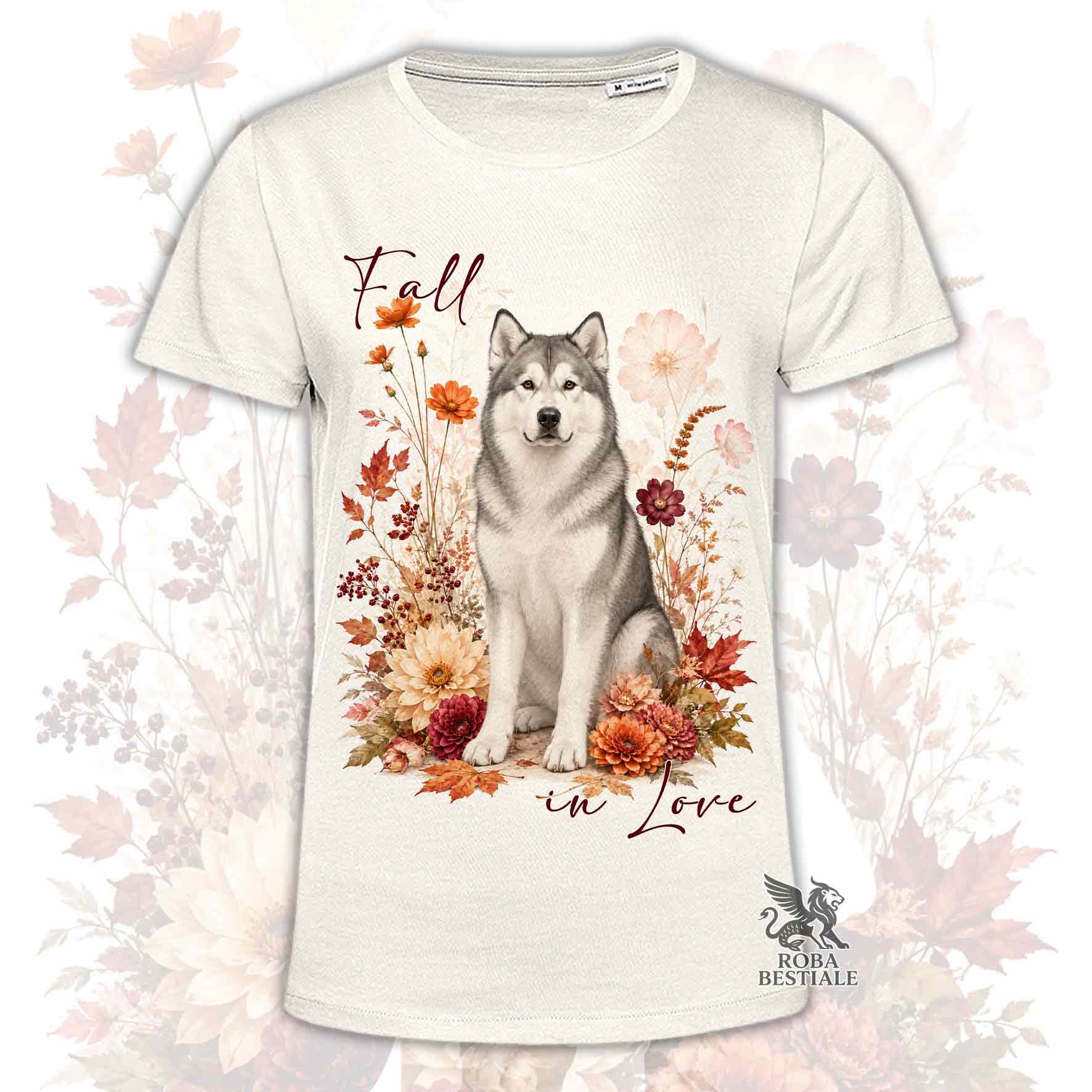 T-shirt beige stampata con un Alaskan Malamute seduto in mezzo a fiori e foglie autunnali. Grafica originale Roba Bestiale, collezione Fall