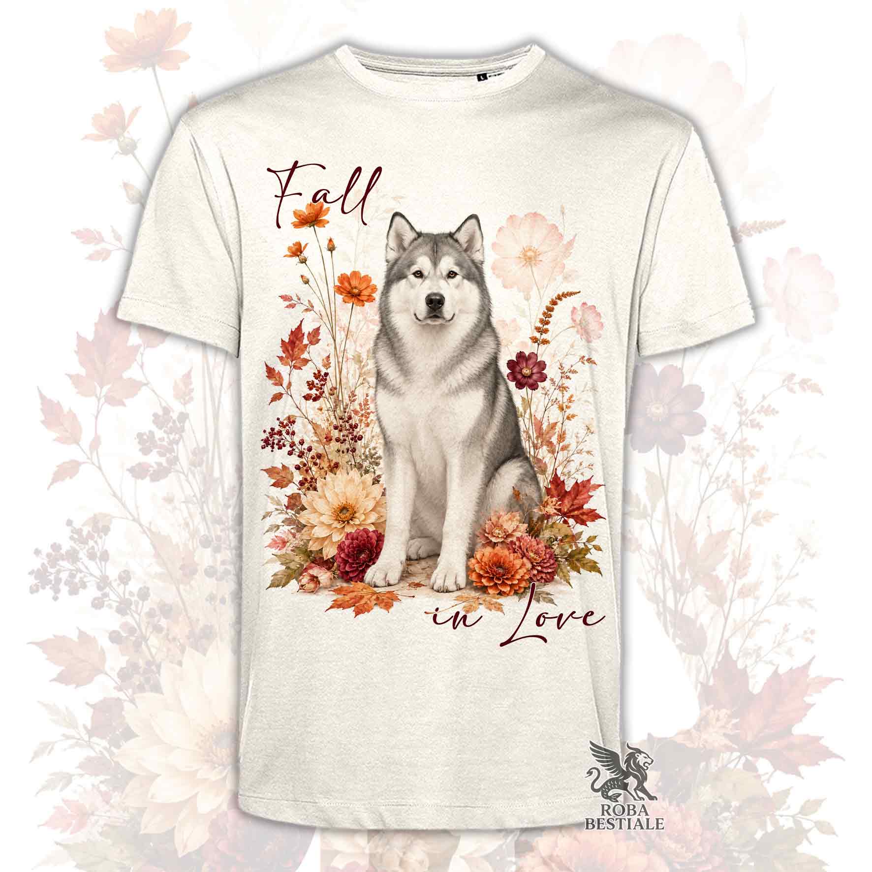 T-shirt beige stampata con un Alaskan Malamute seduto in mezzo a fiori e foglie autunnali. Grafica originale Roba Bestiale, collezione Fall