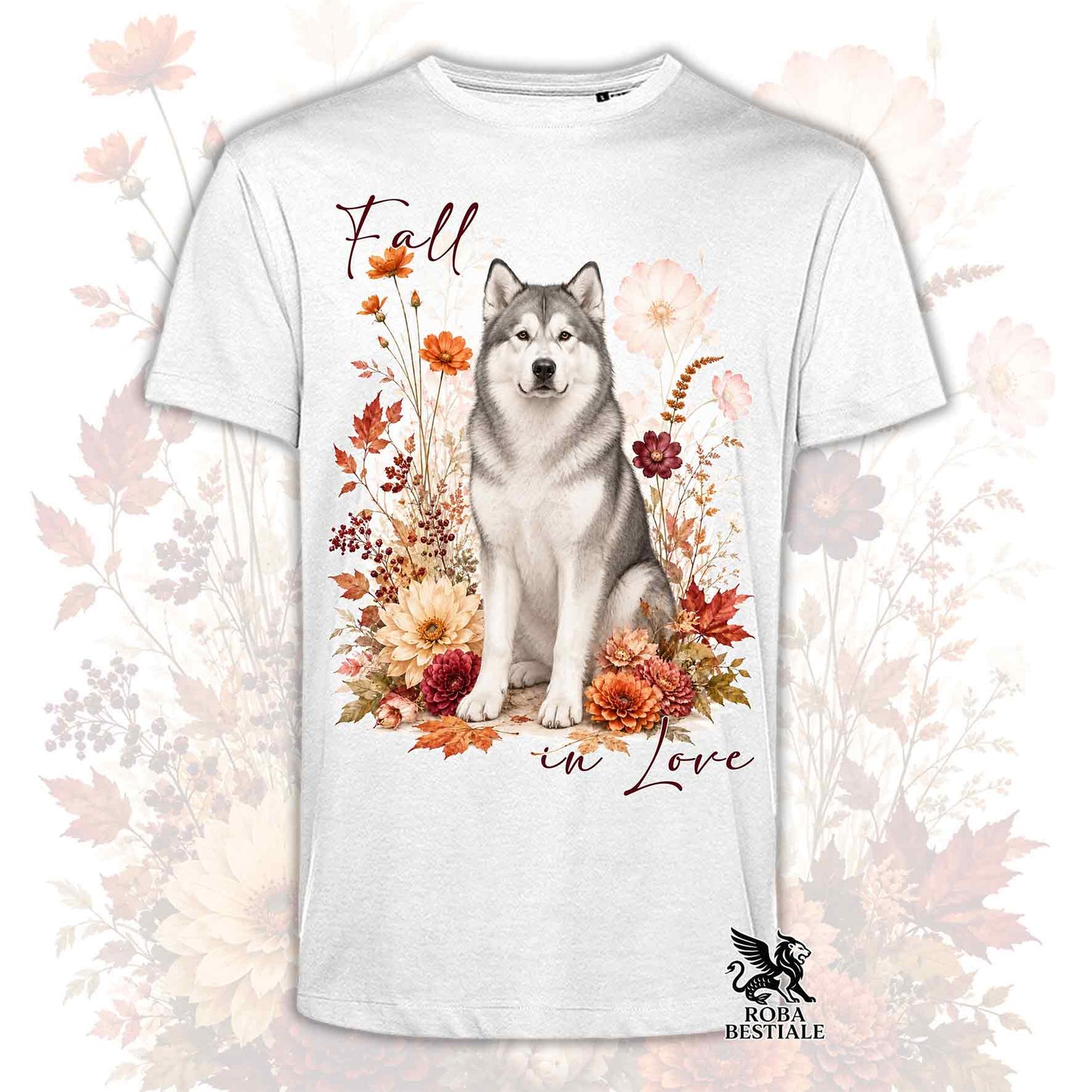 T-shirt bianca stampata con un Alaskan Malamute seduto in mezzo a fiori e foglie autunnali. Grafica originale Roba Bestiale, collezione Fall