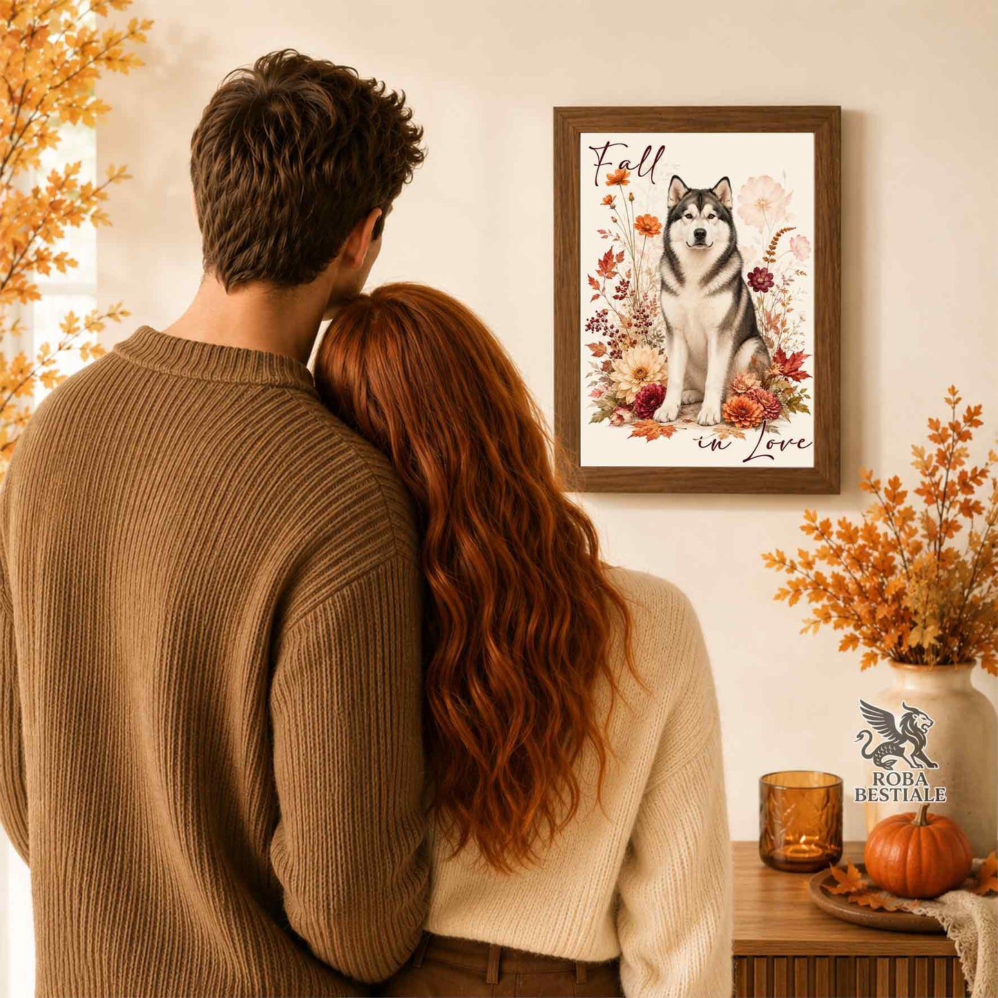 Quadretto con la stampa A4 di un Alaskan Malamute seduto in mezzo a fiori e foglie autunnali. Grafica originale Roba Bestiale, collezione Fall in Love