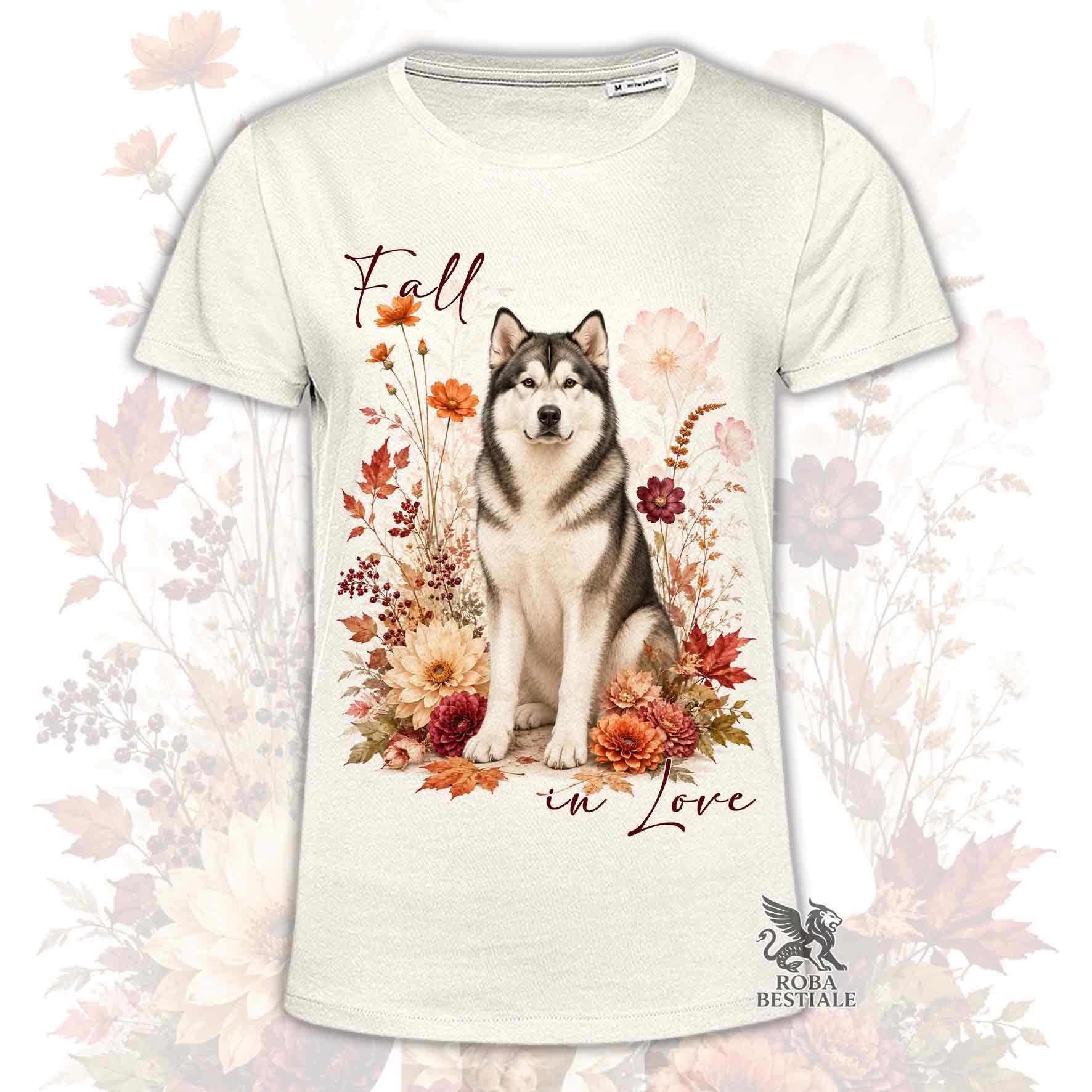 T-shirt beige stampata con un Alaskan Malamute seduto in mezzo a fiori e foglie autunnali. Grafica originale Roba Bestiale, collezione Fall