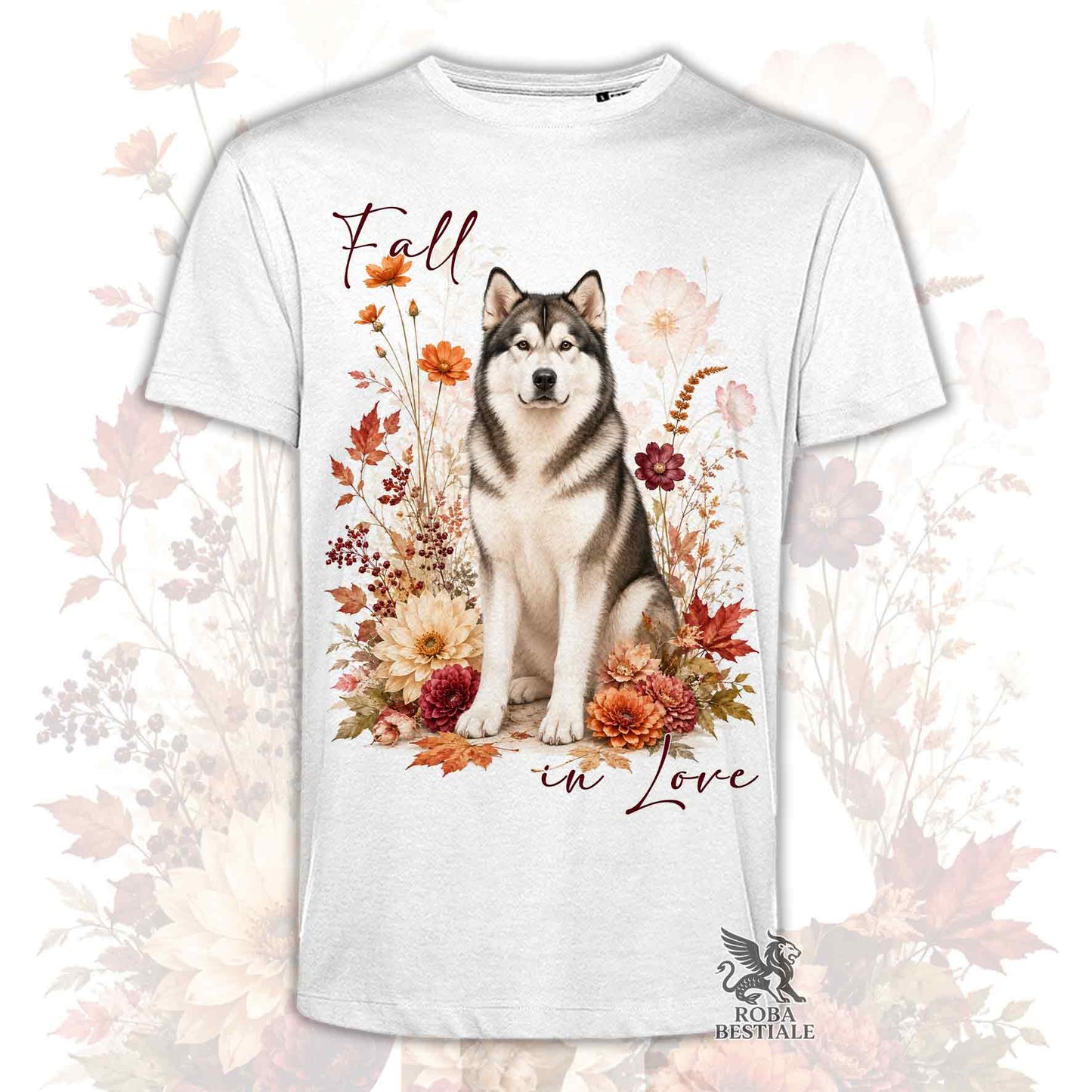 T-shirt bianca stampata con un Alaskan Malamute seduto in mezzo a fiori e foglie autunnali. Grafica originale Roba Bestiale, collezione Fall