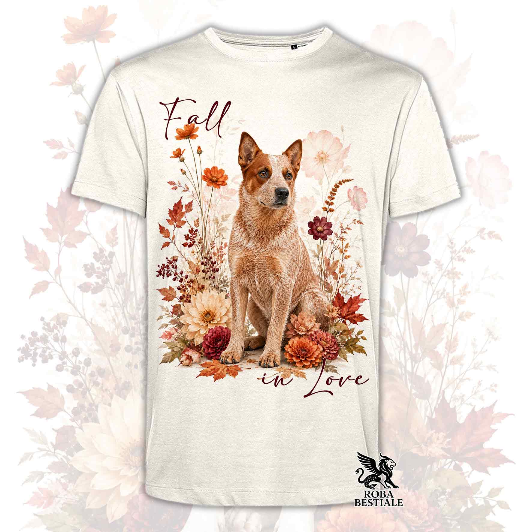 T-shirt bianca stampata con un Australian Cattle Dog seduto in mezzo a fiori e foglie autunnali. Grafica originale Roba Bestiale, collezione Fall