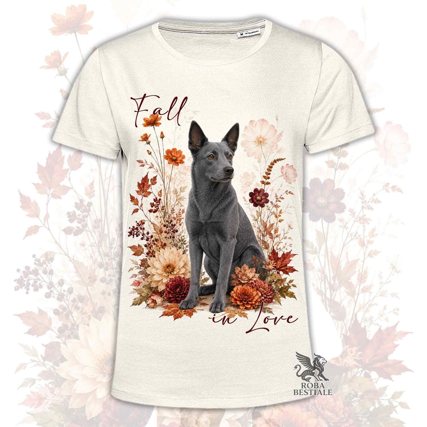 T-shirt beige stampata con un Australian Kelpie seduto in mezzo a fiori e foglie autunnali. Grafica originale Roba Bestiale, collezione Fall