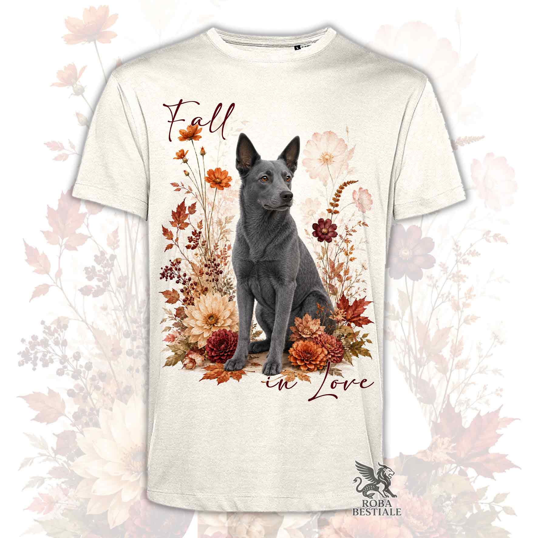 T-shirt beige stampata con un Australian Kelpie seduto in mezzo a fiori e foglie autunnali. Grafica originale Roba Bestiale, collezione Fall