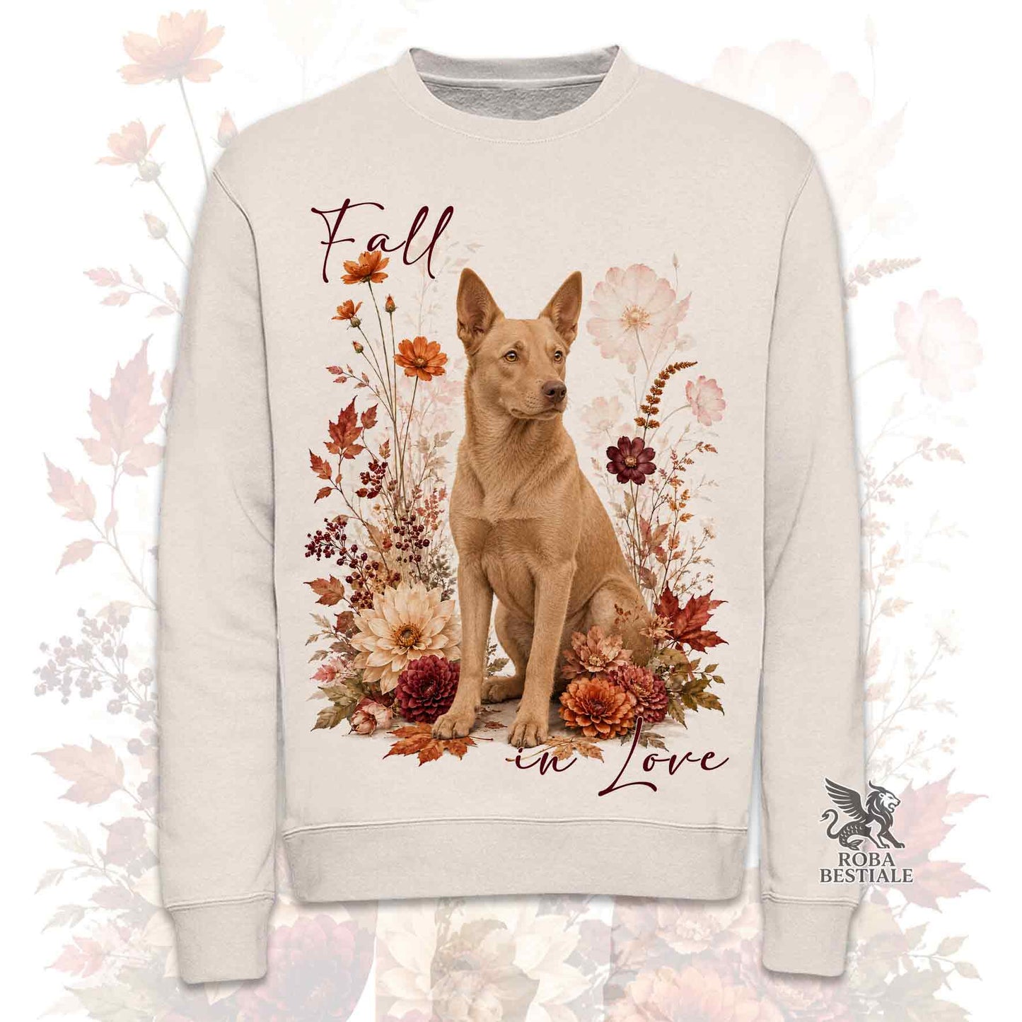 Felpa girocollo beige stampata con un Australian Kelpie seduto in mezzo a fiori e foglie autunnali. Grafica originale Roba Bestiale, collezione Fall in Love