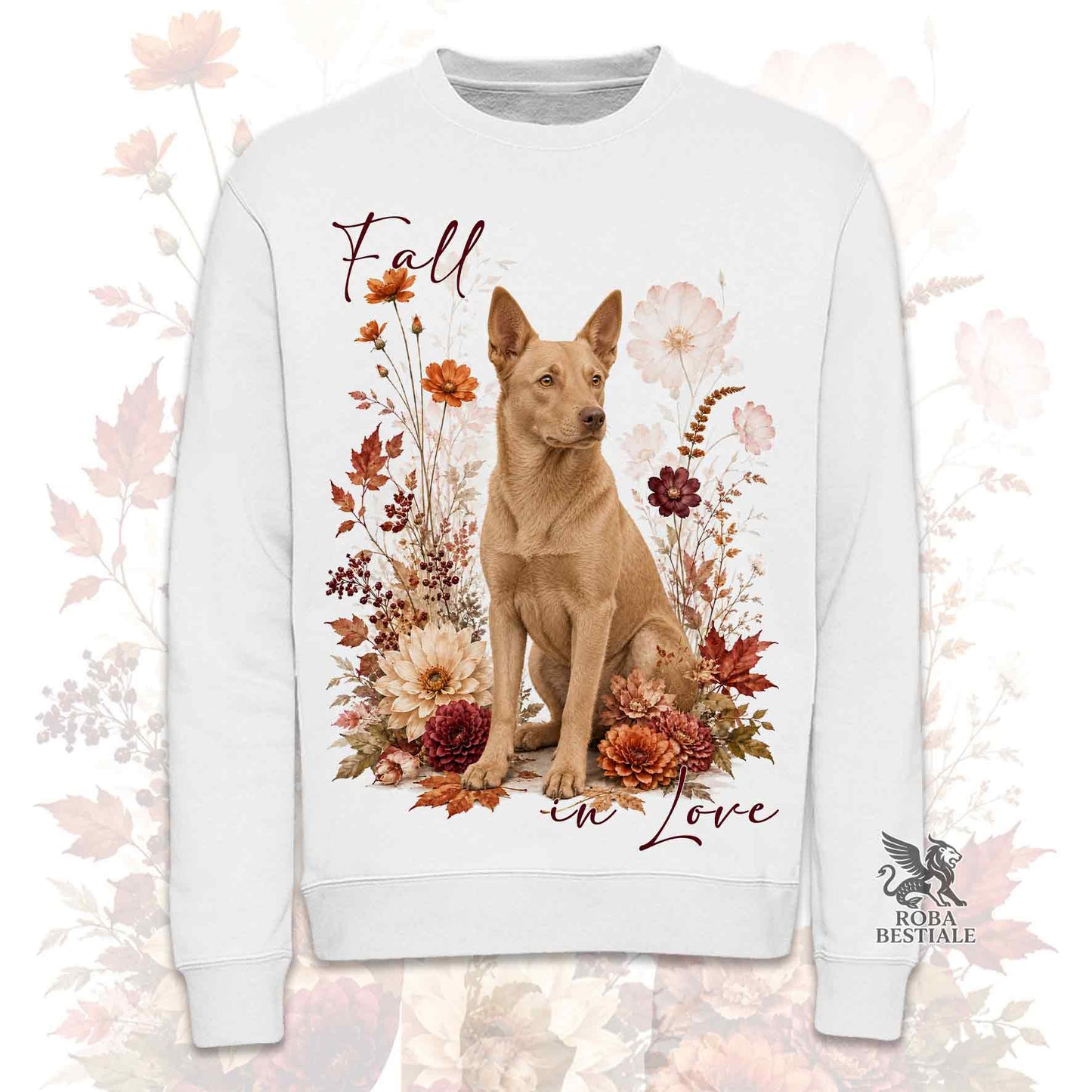 Felpa girocollo bianca stampata con un Australian Kelpie seduto in mezzo a fiori e foglie autunnali. Grafica originale Roba Bestiale, collezione Fall in Love