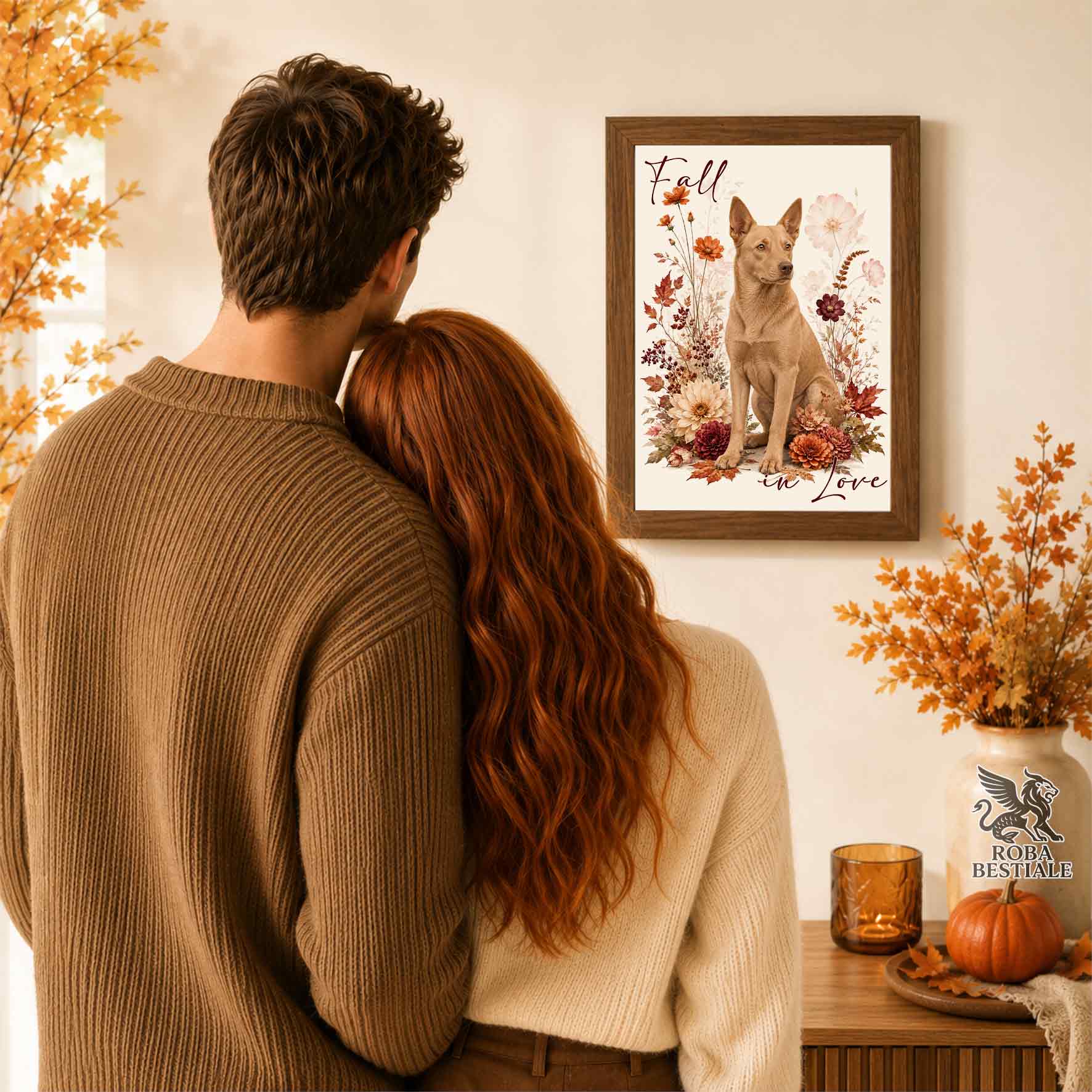 Quadretto con la stampa A4 di un Australian Kelpie seduto in mezzo a fiori e foglie autunnali. Grafica originale Roba Bestiale, collezione Fall in Love