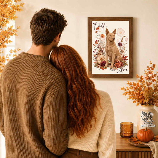 Quadretto con la stampa A4 di un Australian Kelpie seduto in mezzo a fiori e foglie autunnali. Grafica originale Roba Bestiale, collezione Fall in Love