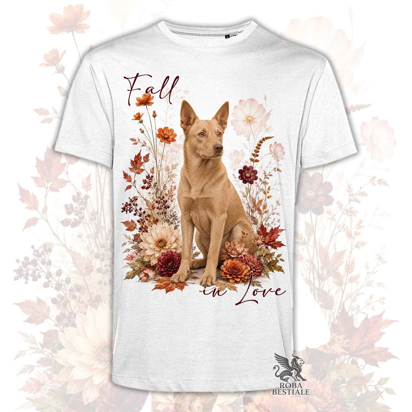 T-shirt bianca stampata con un Australian Kelpie seduto in mezzo a fiori e foglie autunnali. Grafica originale Roba Bestiale, collezione Fall