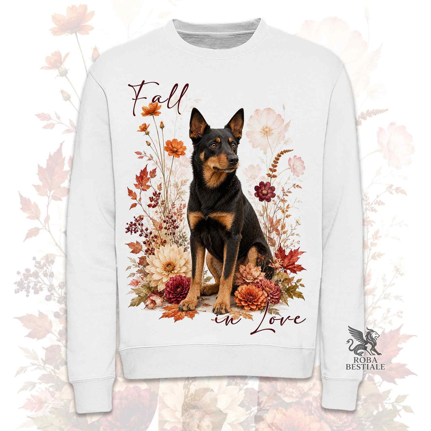 Felpa girocollo bianca stampata con un Australian Kelpie seduto in mezzo a fiori e foglie autunnali. Grafica originale Roba Bestiale, collezione Fall in Love