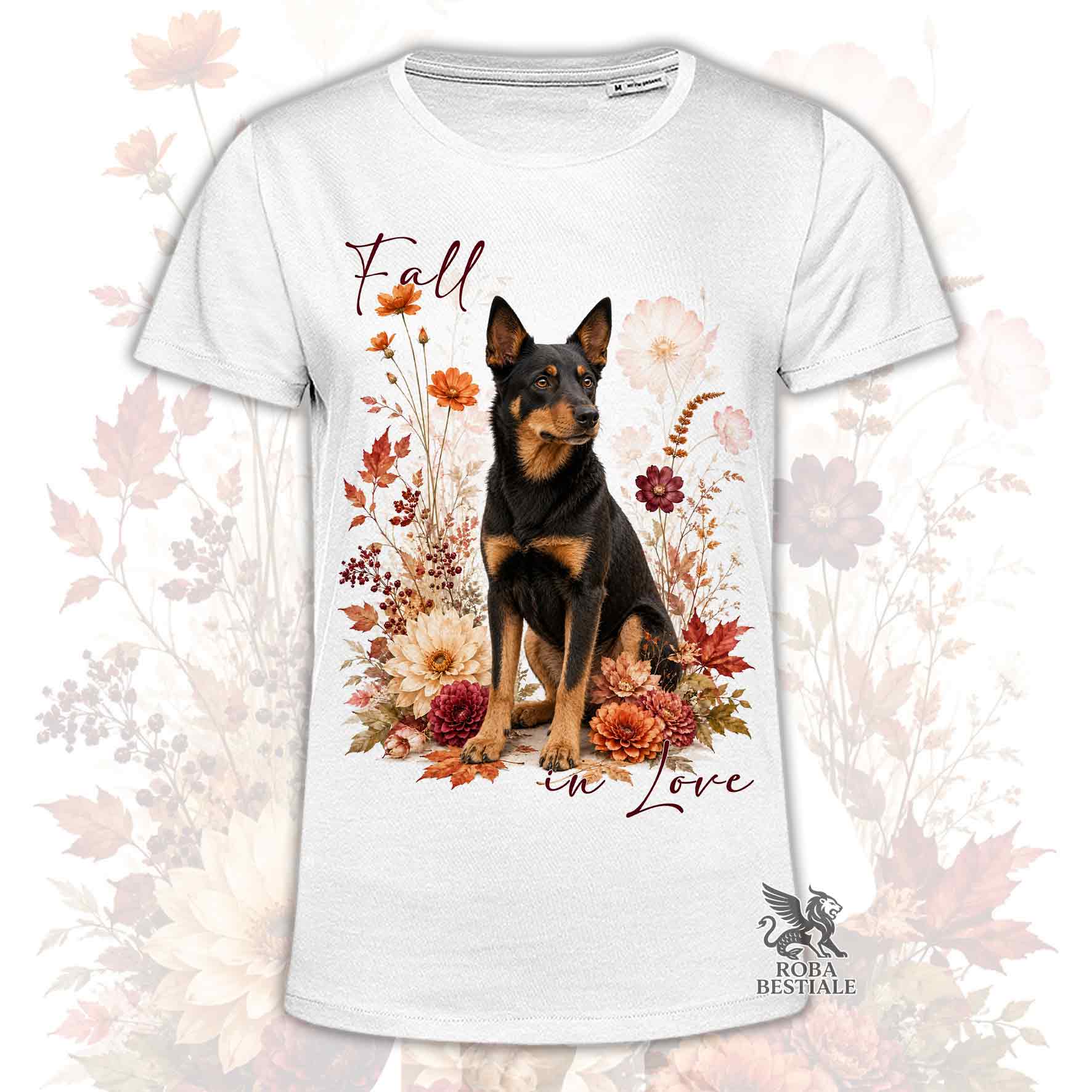 T-shirt bianca stampata con un Australian Kelpie seduto in mezzo a fiori e foglie autunnali. Grafica originale Roba Bestiale, collezione Fall