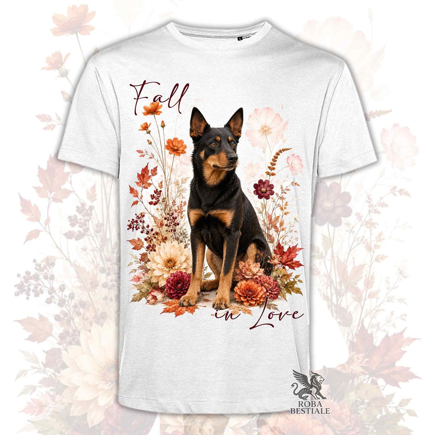 T-shirt bianca stampata con un Australian Kelpie seduto in mezzo a fiori e foglie autunnali. Grafica originale Roba Bestiale, collezione Fall