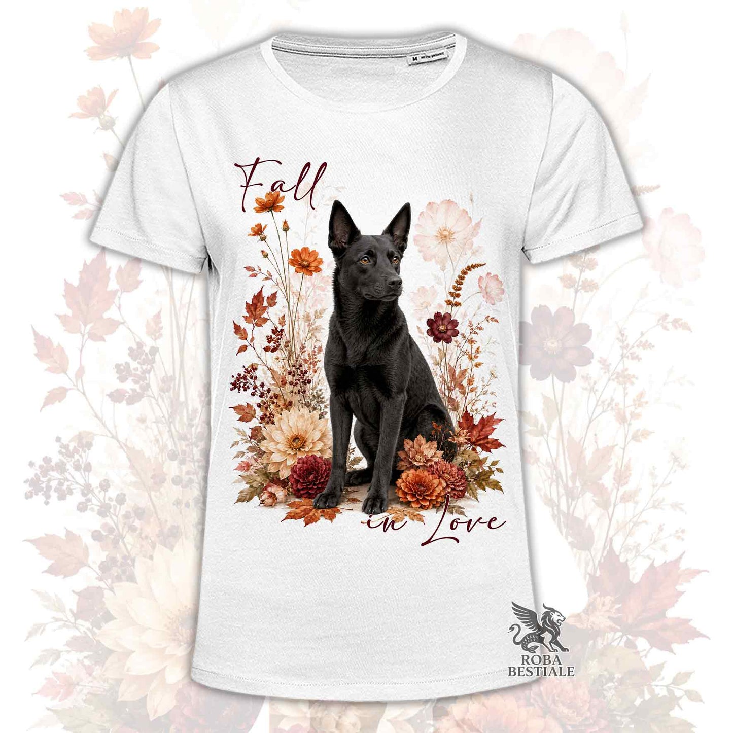 T-shirt bianca stampata con un Australian Kelpie seduto in mezzo a fiori e foglie autunnali. Grafica originale Roba Bestiale, collezione Fall