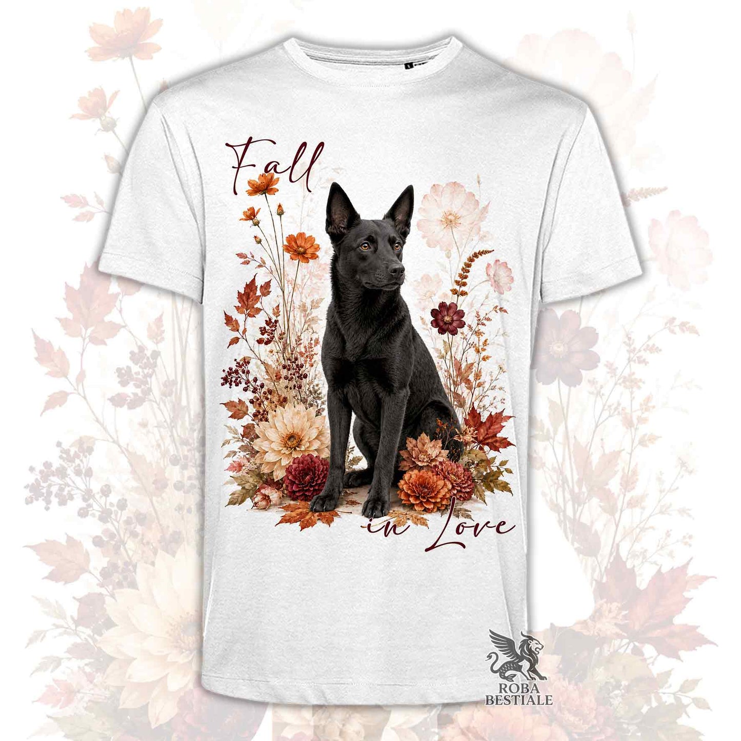T-shirt bianca stampata con un Australian Kelpie seduto in mezzo a fiori e foglie autunnali. Grafica originale Roba Bestiale, collezione Fall