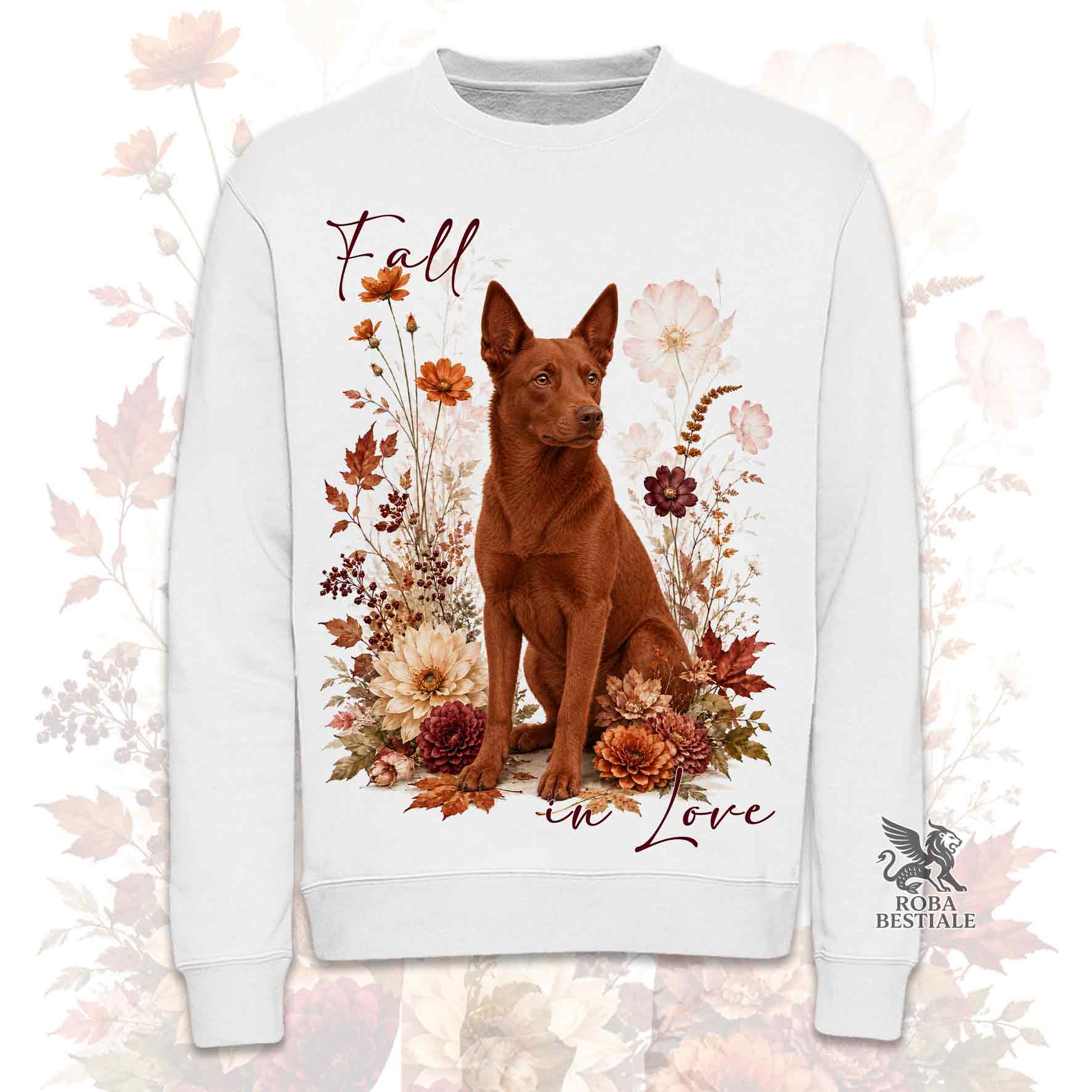 Felpa girocollo bianco stampata con un Australian Kelpie seduto in mezzo a fiori e foglie autunnali. Grafica originale Roba Bestiale, collezione Fall in Love