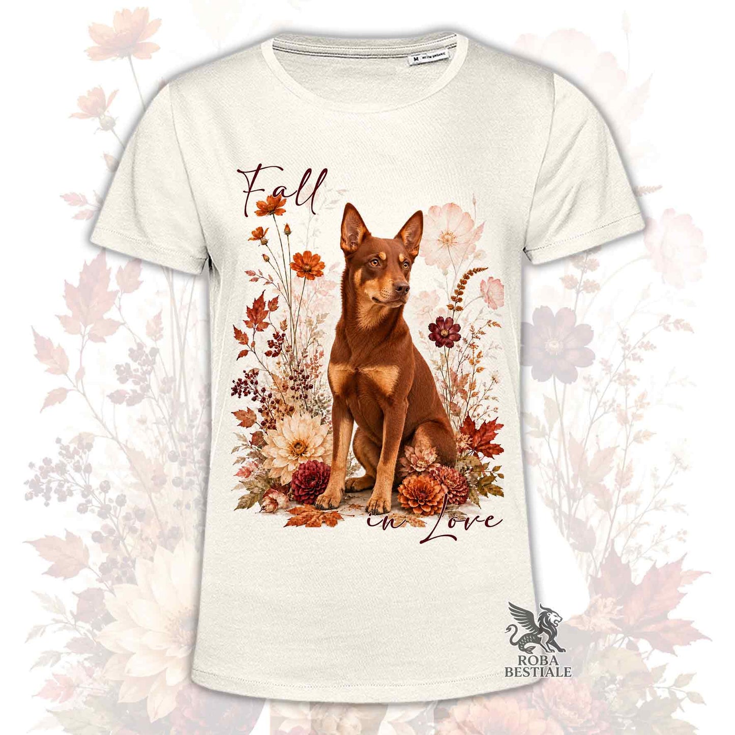 T-shirt beige stampata con un Australian Kelpie seduto in mezzo a fiori e foglie autunnali. Grafica originale Roba Bestiale, collezione Fall