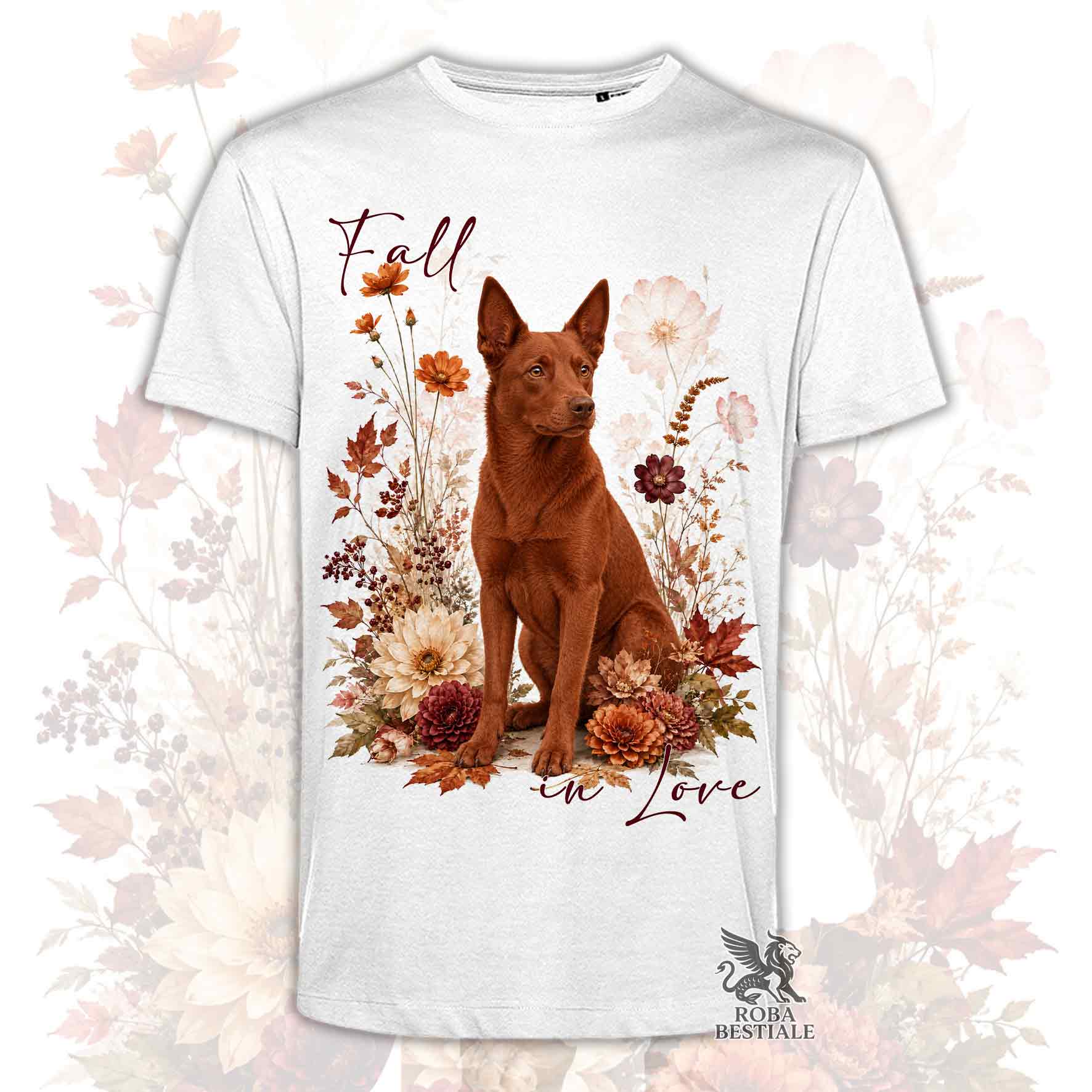 T-shirt bianca stampata con un Australian Kelpie seduto in mezzo a fiori e foglie autunnali. Grafica originale Roba Bestiale, collezione Fall