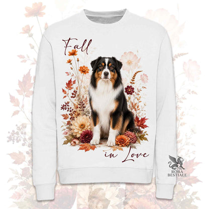 Felpa girocollo bianca stampata con un Australian Shepherd seduto in mezzo a fiori e foglie autunnali. Grafica originale Roba Bestiale, collezione Fall in Love