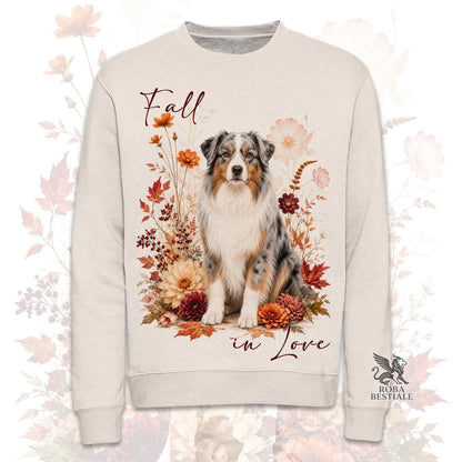 Felpa girocollo beige stampata con un Australian Kelpie seduto in mezzo a fiori e foglie autunnali. Grafica originale Roba Bestiale, collezione Fall in Love