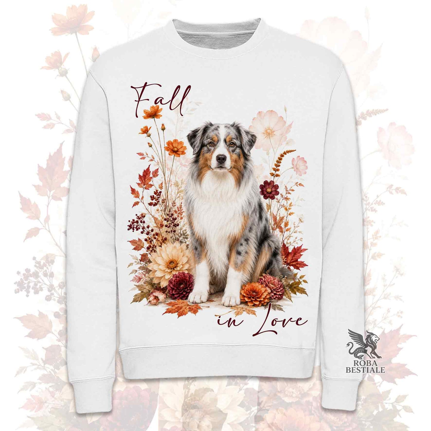 Felpa girocollo bianca stampata con un Australian Kelpie seduto in mezzo a fiori e foglie autunnali. Grafica originale Roba Bestiale, collezione Fall in Love